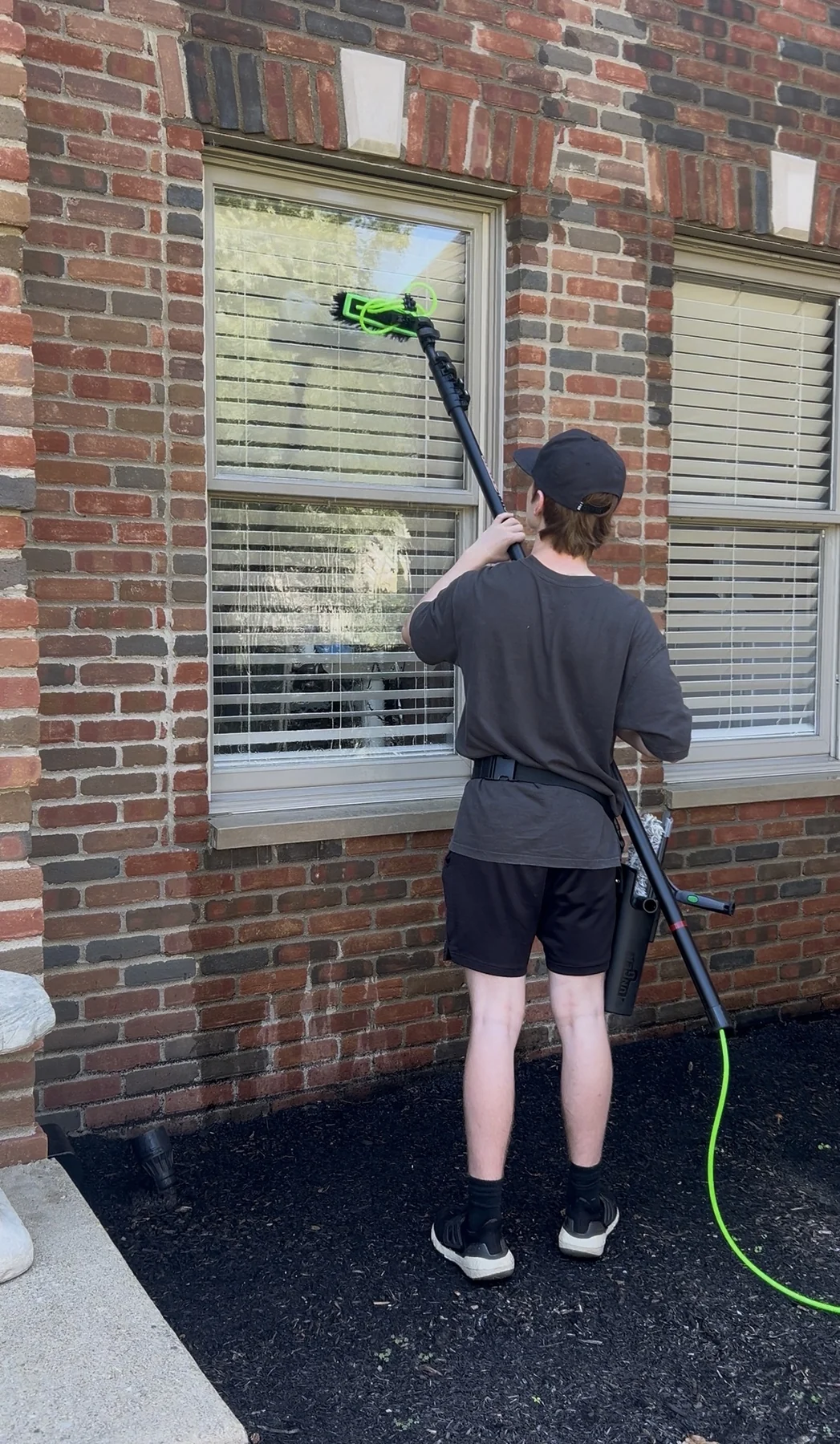 Motion Washing cleaning exterior glass with a purified-water brush